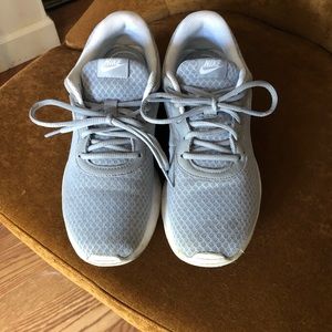 Nike athletic shoes.  Women’s size 9
